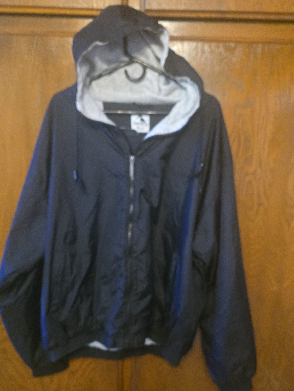 Augusta Sportswear Black Hooded Windbreaker with Gray Lining